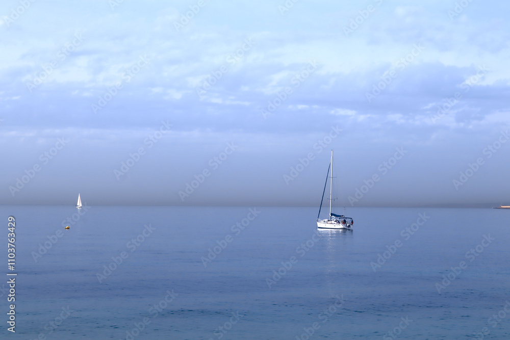 Seascape with a yacht in Palma, Mallorca, Spain Seascape with a yacht in Palma, Mallorca, Spain