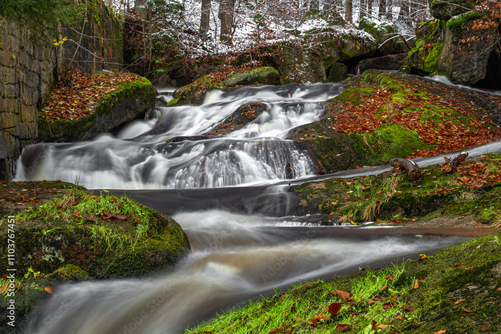 Valley of river Cerna Nisa and waterfalls in autumn cloudy morning Valley of river Cerna Nisa and waterfalls in autumn cloudy morning