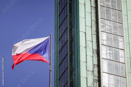 Obraz na płótnie Czech national flag waving in wind with building behind, blue sky w salonie