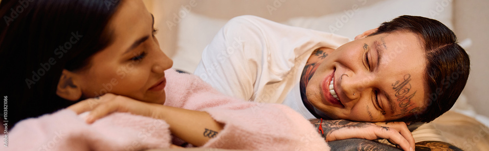 Joyful couple shares intimate laughter and smiles while lying close in a warm and inviting space Joyful couple shares intimate laughter and smiles while lying close in a warm and inviting space