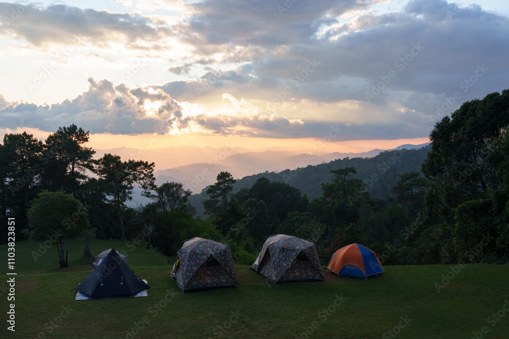 Camping tents on the top of mountain during beautiful sunset National Park, Chiang mai, Thailand Camping tents on the top of mountain during beautiful sunset National Park, Chiang mai, Thailand
