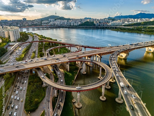 Photography Sunset aerial view of road junction at the bridge across the Han river in Seoul,