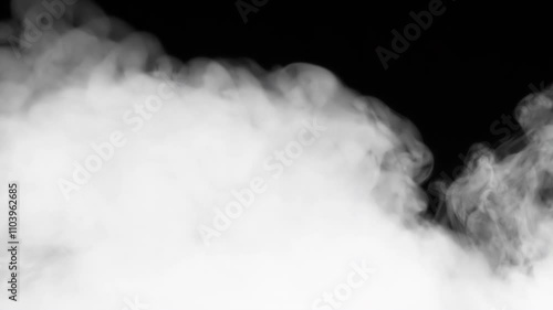 Smoke Transition from Black to White. A jet of white smoke creates an elegant transition between frames with the blending mode 