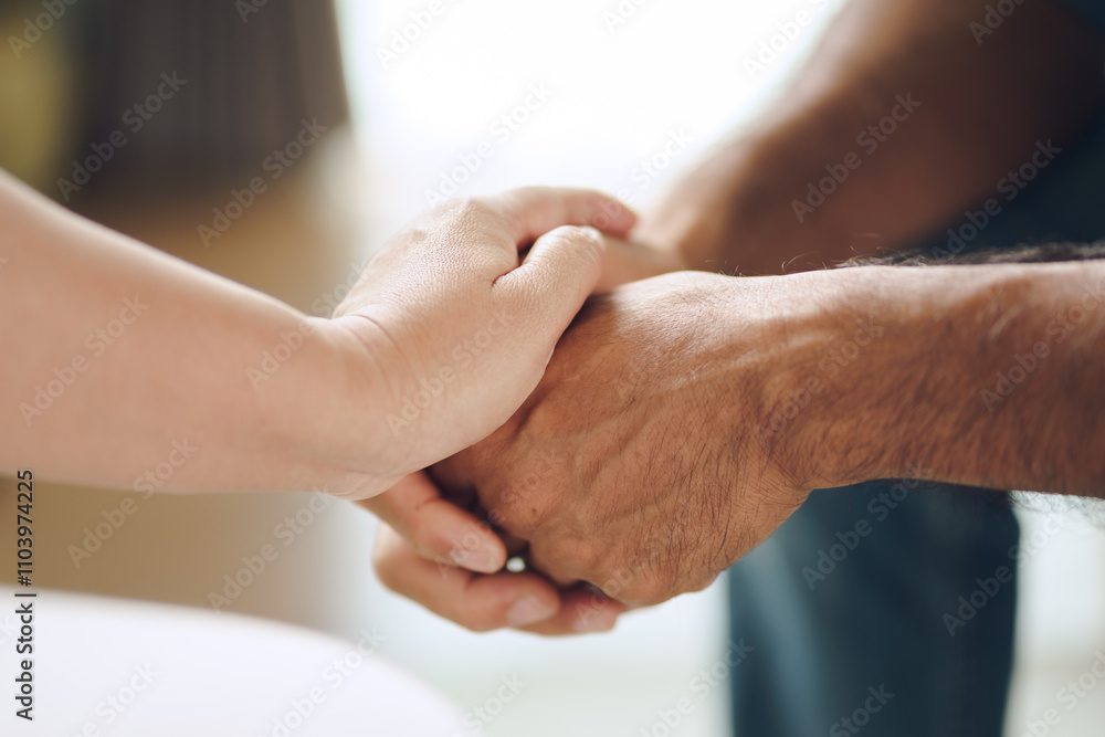 Female friend or family sitting and hold hands during cheer up to mental depress man Female friend or family sitting and hold hands during cheer up to mental depress man
