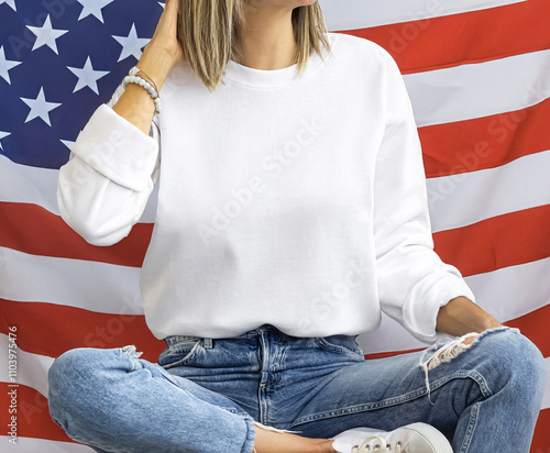 Young woman in sweater at 4th of July background closeup. (Only background modified with AI ) Mock up for sweatshirt USA design photo