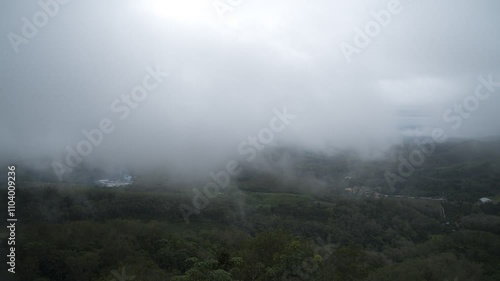 A cloudy of foggy landscape view on top view of mountain at sunrise timing in winter season