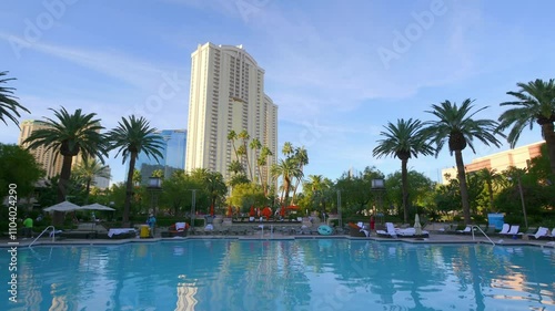 Time lapse of a luxury resort in Las Vegas with a scenic pool and palm trees in 4K