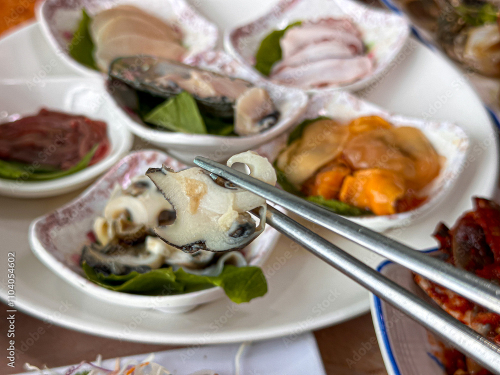 Korean seafood. fresh abalone sashimi Korean seafood. fresh abalone sashimi