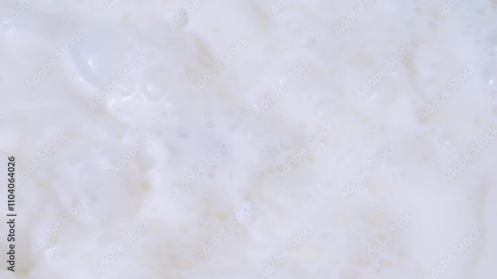 Radishes splashing into milk in slow motion 300fps Radishes splashing into milk in slow motion 300fps