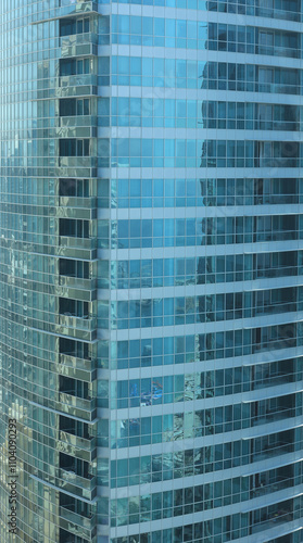 skyscraper background with windows and reflections