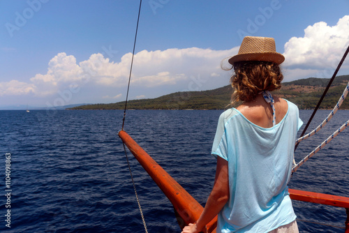 Woman enjoying summer on a boat