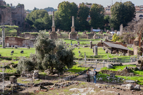 The Roman Forum also known by its Latin name Forum Romanum, is a rectangular forum surrounded by the ruins of several important ancient government buildings at the centre of the city of Rome. Italy photo