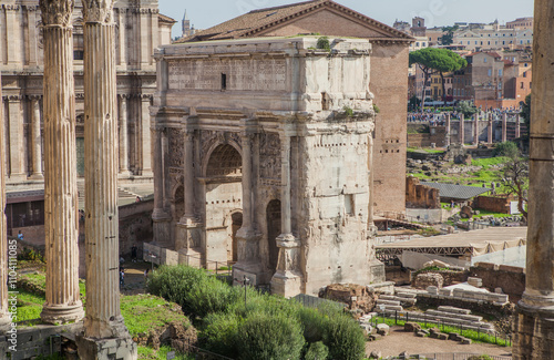 The Roman Forum also known by its Latin name Forum Romanum, is a rectangular forum surrounded by the ruins of several important ancient government buildings at the centre of the city of Rome. Italy photo