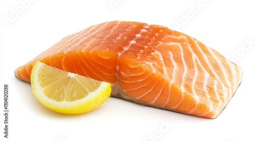  a piece of salmon with a slice of lemon on a white background The salmon is a light pinkish-orange color and the lemon is a bright yellow The contrast between the photo