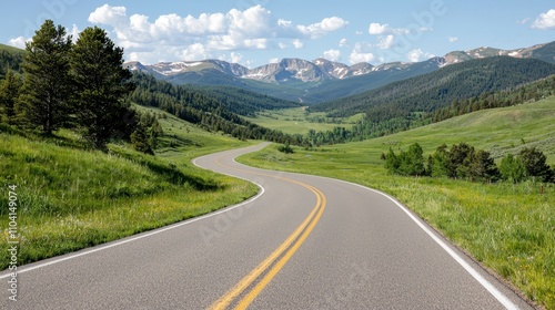  a winding road in the middle of a grassy field with trees on either side and mountains in the background The sky is filled with clouds, creating a peaceful atmosph