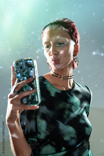 Futuristic woman taking selfie in a digital environment photo