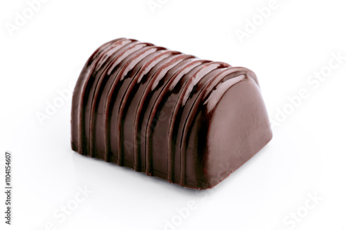 Gourmet chocolate truffle with a glossy finish on white background