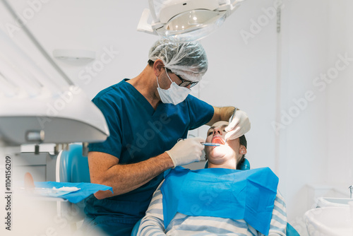Dentist performing dental check-up in professional clinic setting