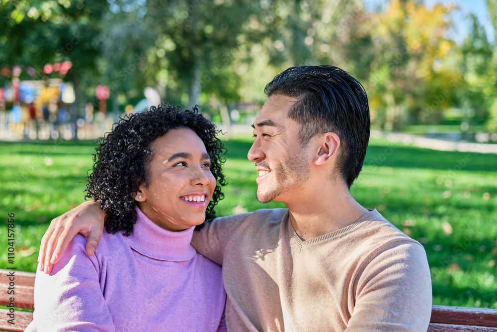 Happy couple enjoying quality time together in a park Happy couple enjoying quality time together in a park