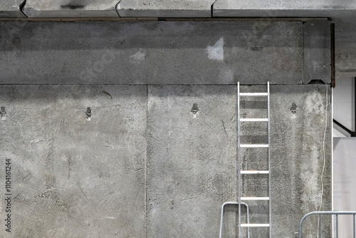 Steel staircase near concre...