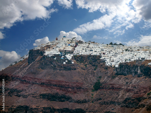 City of Fira seen from the Athinios ferry port, Santorini, Greece photo