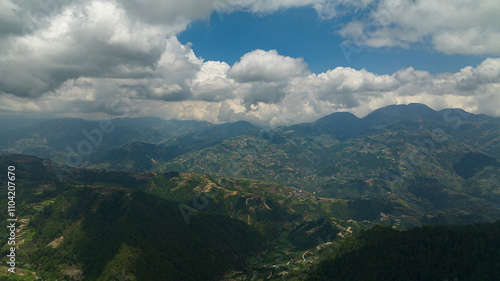 Top view of rice terraces and agricultural land on hillsides in a mountainous province. Philippines, Luzon.