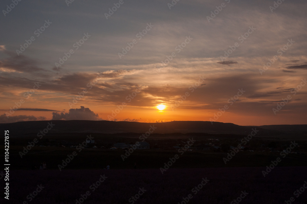 Naklejka premium A sunset sky with clouds