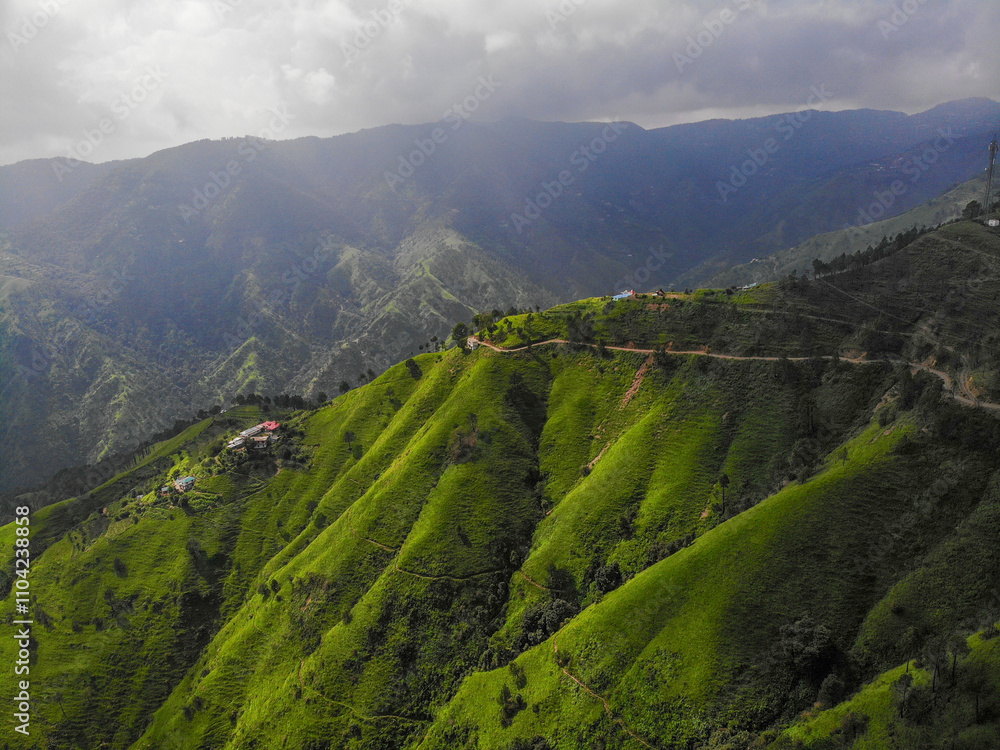 Fototapeta premium Landscape of rolling hill lush green mountains