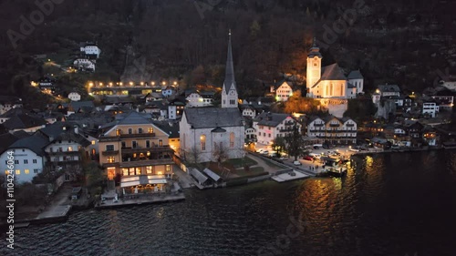 Night flight over of Hallstatt village in Salzkammergut, Upper Austria.