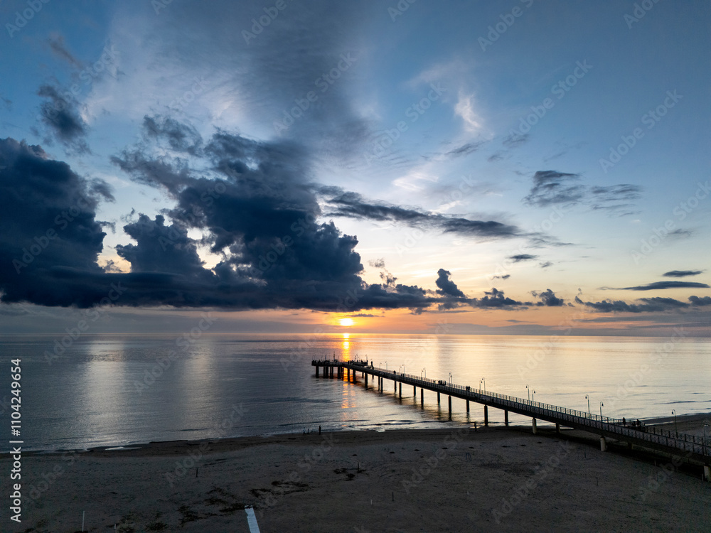 Fototapeta premium Aerial view of the beach and the pier in Marina di Pietrasanta, Tuscany