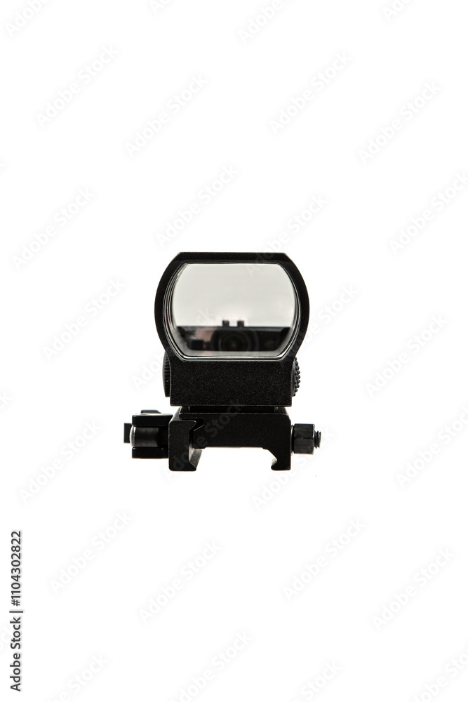 A black tactical reflex sight with adjustment knobs and a mounting base, designed for precision aiming on firearms, isolated on a white back. A black tactical reflex sight with adjustment knobs and a mounting base, designed for precision aiming on firearms, isolated on a white back.