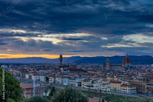 Florence city, Firenze architecture in Italy. Santa Maria del Fiore Cathedral, Duomo huge domes and walls as part of night cityscape from the hill above the city