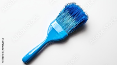 Wallpaper Mural  a blue paint brush on a white background The brush has a long handle with a curved end and a wide, flat head The bristles are soft and fluffy, and the handle is m Torontodigital.ca