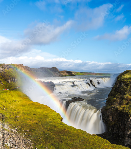 The Gullfoss waterfall on iceland as part of the Golden Circle, with long exposure for smooth water and rainbow