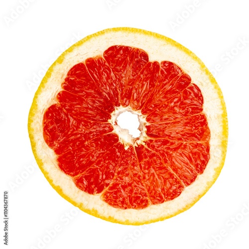 A vibrant slice of grapefruit showcasing its juicy, segmented interior and bright yellow rind.