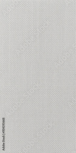 Close up of a textured linen fabric in a neutral color, perfect for background or design element, surface