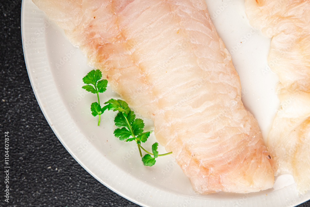 Raw fish fillet fresh tasty food dish delicious gourmet food background on the table rustic food top view copy space keto and paleo diet pescetarian Raw fish fillet fresh tasty food dish delicious gourmet food background on the table rustic food top view copy space keto and paleo diet pescetarian