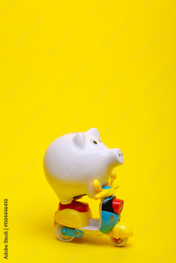 Ceramic white piggy bank on a yellow background. Business concept. Conceptual photo Ceramic white piggy bank on a yellow background. Business concept. Conceptual photo