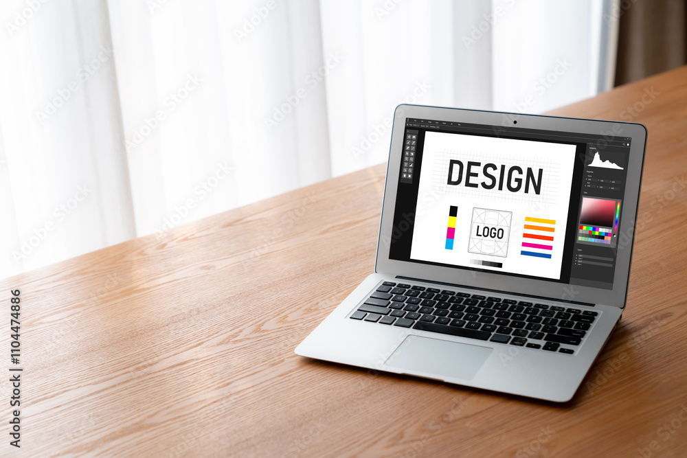 Graphic designer software for modern design of web page and commercial ads showing on the computer screen Graphic designer software for modern design of web page and commercial ads showing on the computer screen