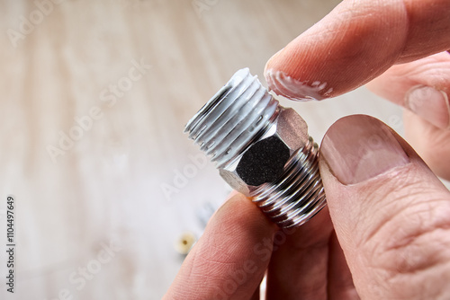 Quadro su tela Leak seal with mounting plumbing paste before winding flax on pipe thread