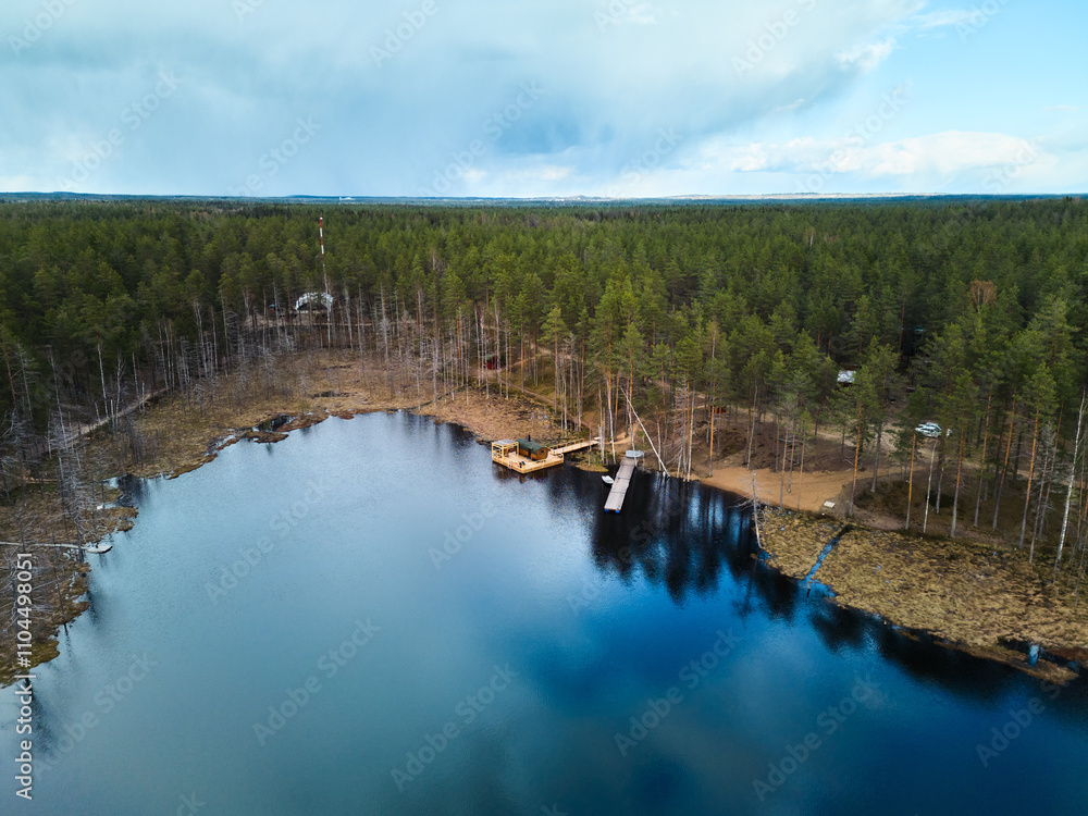 A Serene Lake That Is Beautifully Surrounded by a Lush Forest in the Tranquil Wilderness A Serene Lake That Is Beautifully Surrounded by a Lush Forest in the Tranquil Wilderness