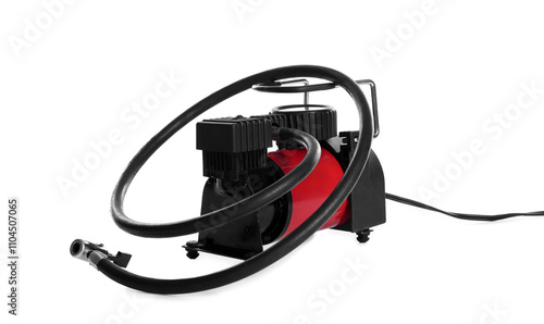 Air compressor with hose isolated on white photo