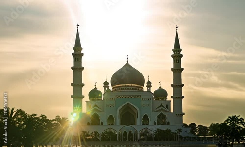 Beautiful Sunset Above Mosque with Lens Flare