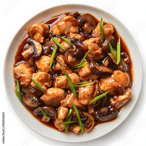 moo goo gai pan is the americanized version of a cantonese dish chicken with mushroom in oyster sauce closeup on the plate on the table. horizontal top view from above with white shades,  photo