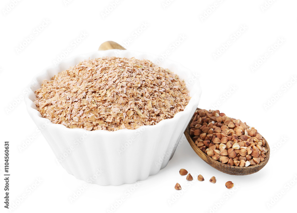 Buckwheat bran in bowl and grains isolated on white Buckwheat bran in bowl and grains isolated on white
