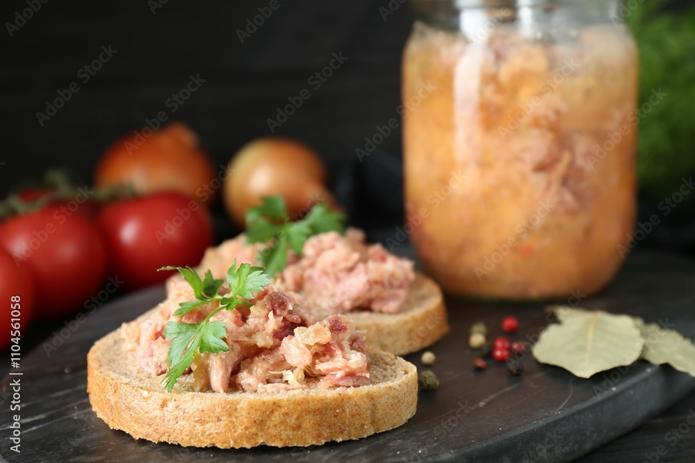 Sandwiches with canned meat and spices on table, closeup Sandwiches with canned meat and spices on table, closeup