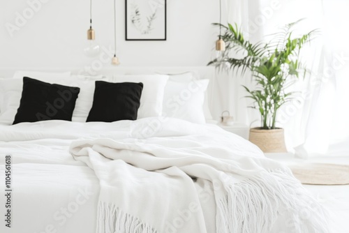 Minimalist white bedroom with black accents, cozy textures, and natural greenery, designed with tranquility by Generative AI.