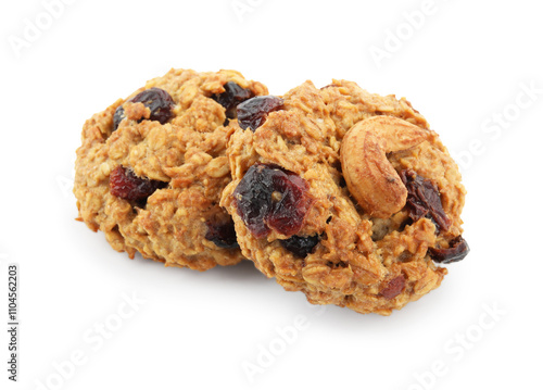 Delicious oatmeal cookies with dried cranberries and nuts isolated on white