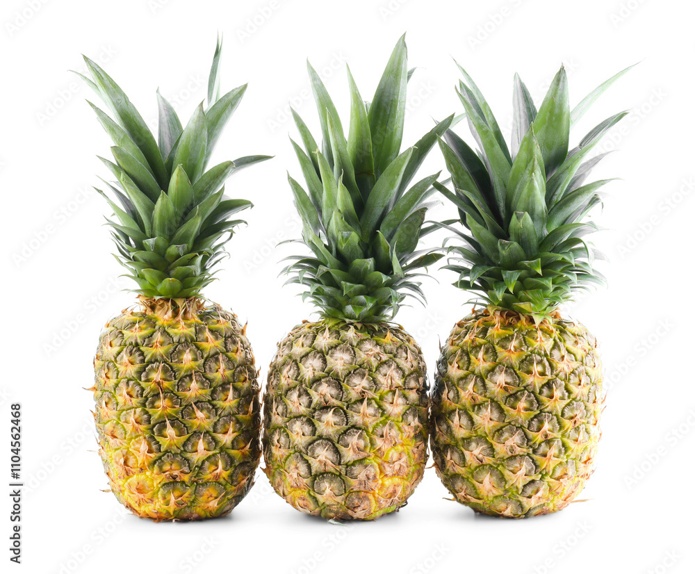 Three fresh ripe pineapples isolated on white Three fresh ripe pineapples isolated on white