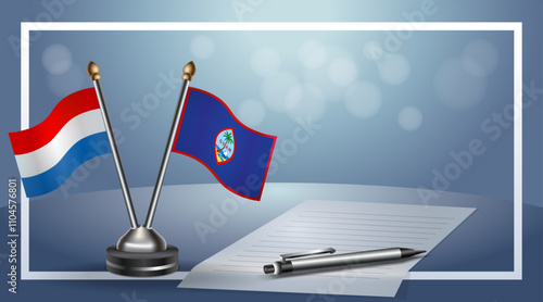 Netherlands and Guam Small national flag on bokeh background, cooperative relationship